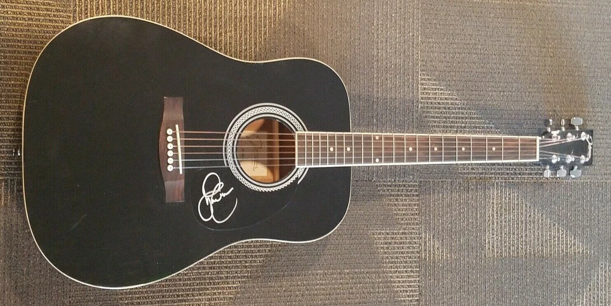 Sara Evans autographed acoustic guitar. Johnson JG 620 B in Black