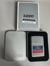 ZIPPO 1996 FORD MOTOR COMPANY TRUCKS POLISHED CHROME LIGHTER SEALED IN BOX 765H