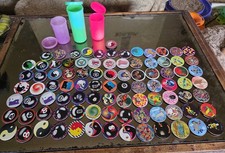 Lot of 90 Pogs 3 Containers and 1 Slammer FS