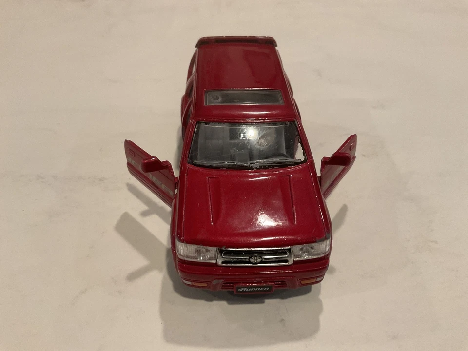 SUV fundido a presión Kinsmart Toyota 4Runner rojo escala 1:36 raro Foto 2 de 4