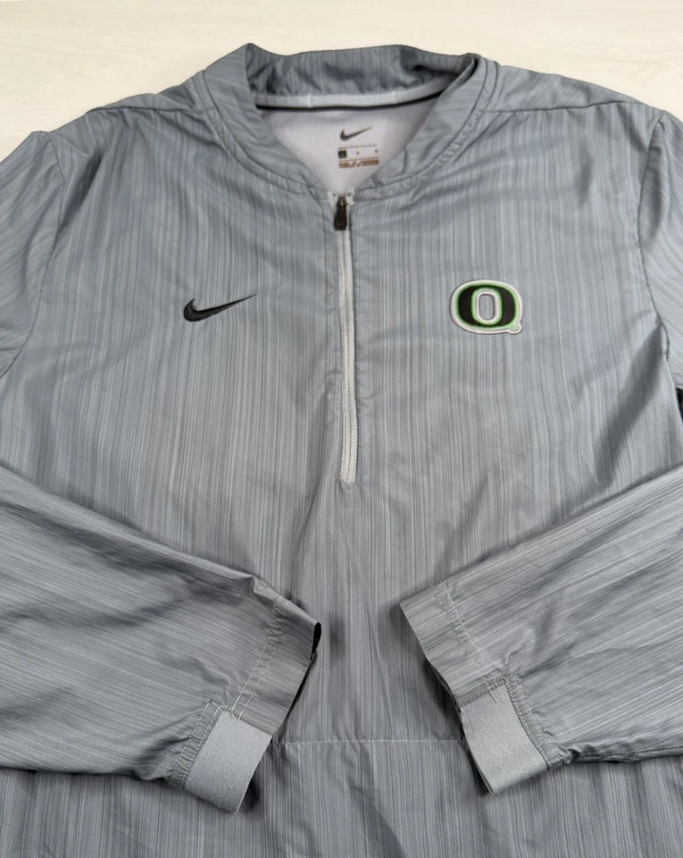Nike Oregon Ducks 1/4 Cremallera Pullover Gris NCAA Cortavientos Chaqueta Ventilada Para Hombres L Foto 3 de 4