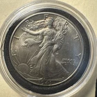 1941 D Walking Liberty Silver Half Dollar, Toned, Choice to Gem Uncirculated.