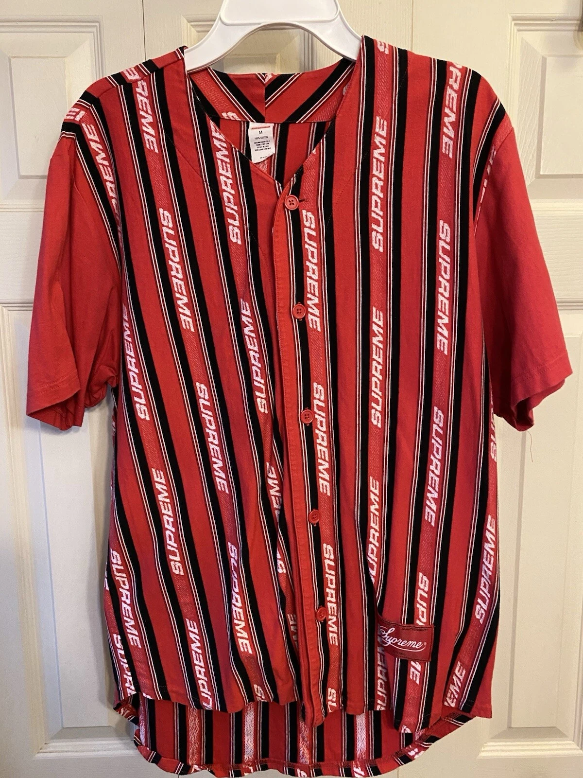 Maillot rayé rouge et noir Supreme   Taille Medium