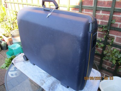 old samsonite hard shell luggage