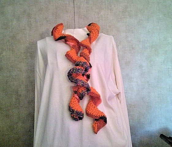 Hand-crocheted dark coral ruffled scarf with fall colors - wearable art boa