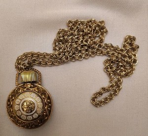 Vintage Avon Moonwind enamel pocket watch-style perfume bottle necklace