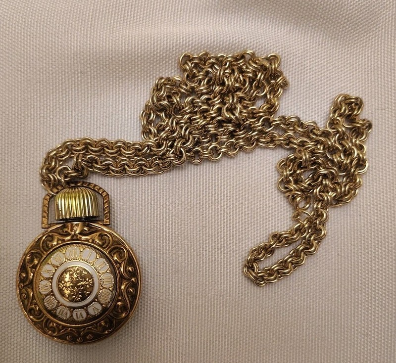 Vintage Avon Moonwind enamel pocket watch-style perfume bottle necklace