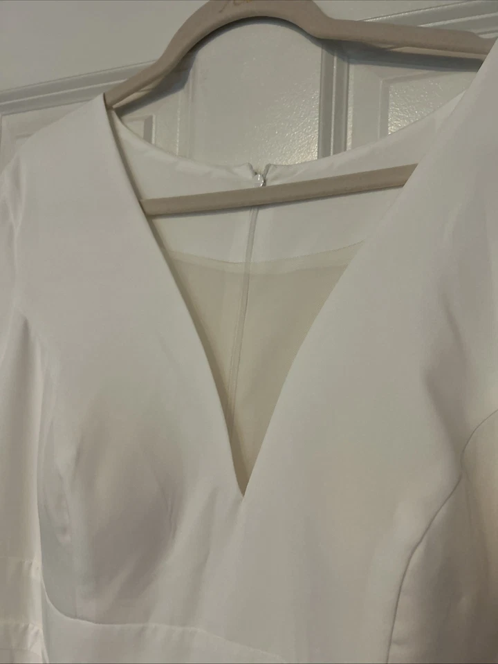 Vestido de novia de tafetán talla 18 nunca usado Foto 2 de 4