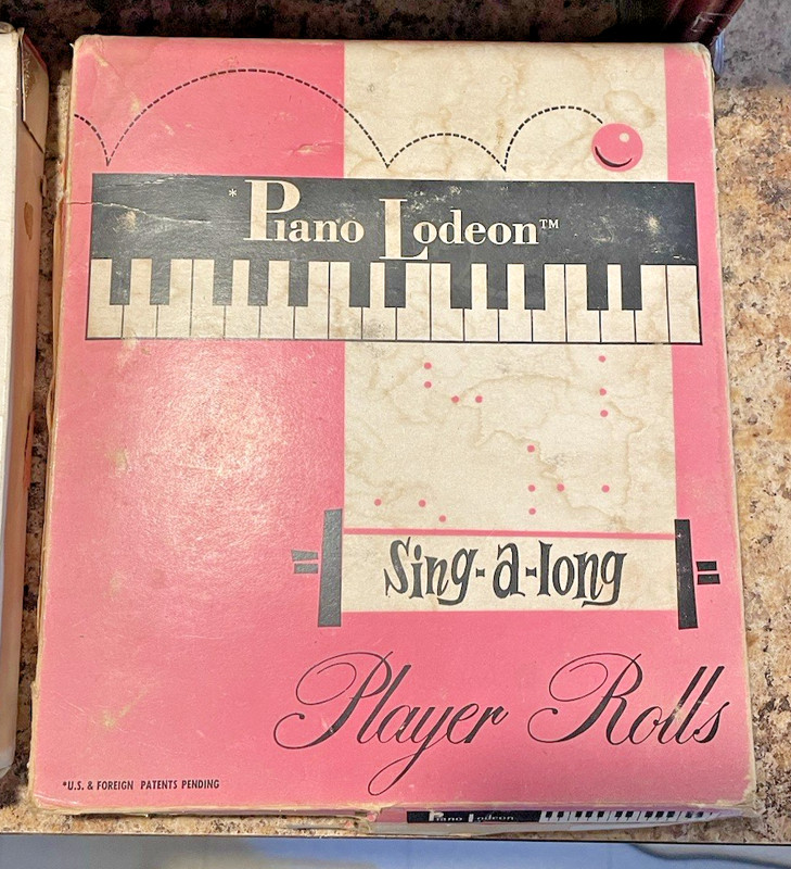 J Chein Piano Lodeon player piano (for parts), 7 player rolls