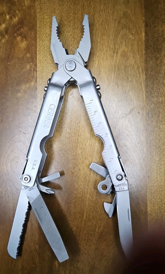 A vintage Gerber MP400 multi-tool with bluntnose pliers — a genuine USA-made classic from before multi-tools became commodity junk, collectible and actually usable.