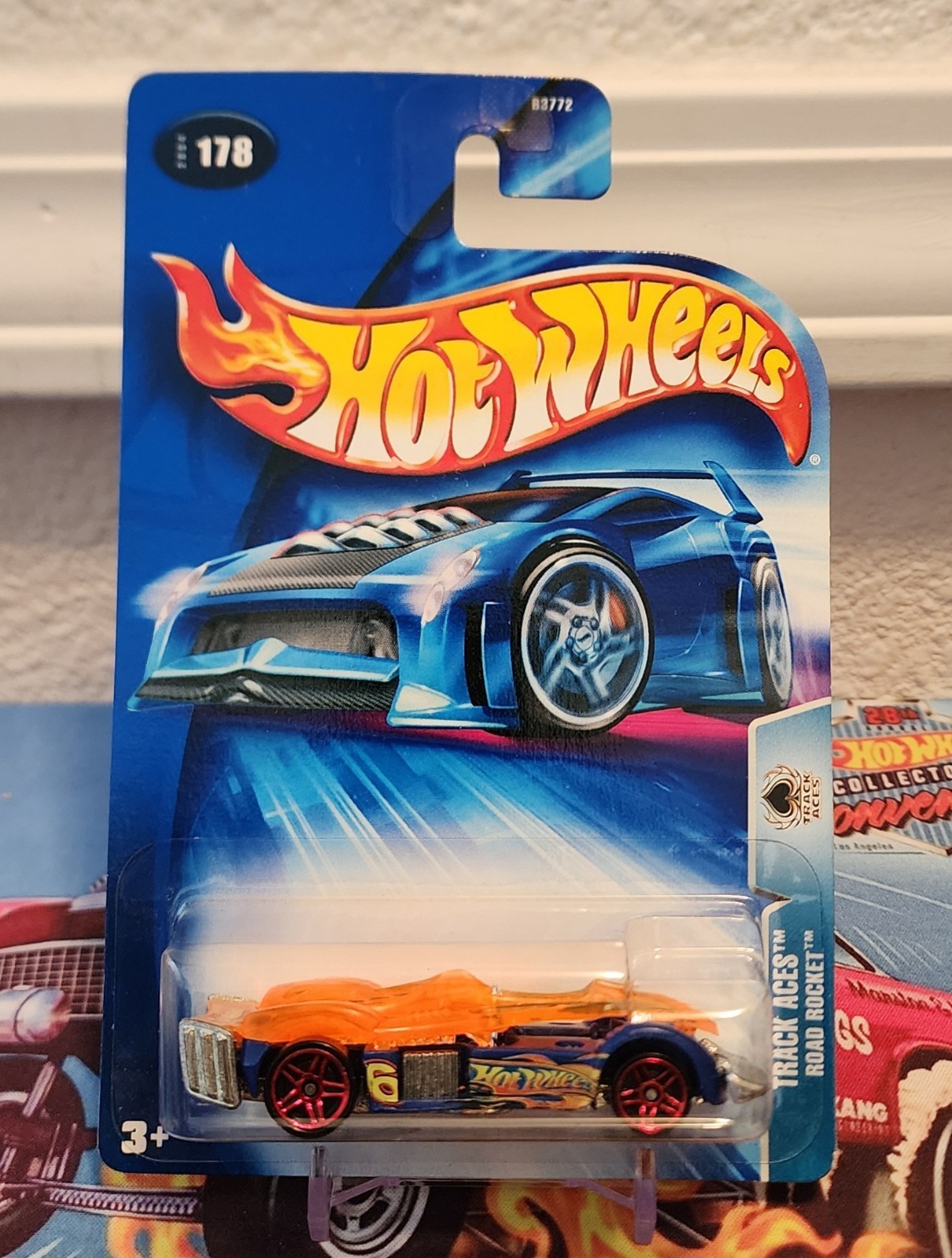 2004 Hot Wheels #178 Track Aces Road Rocket Blue-Orange w/red Pr5 Spoke Wheels
