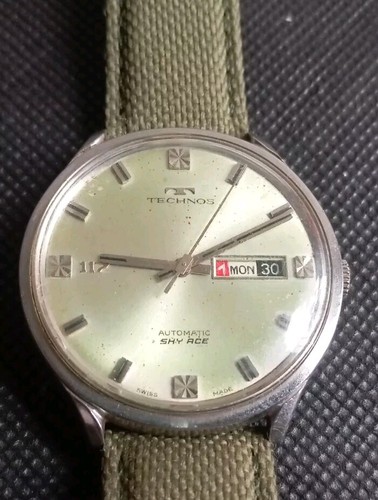 Vintage Technos Sky Ace Automatic Day Date Swiss Made Wrist Watch.