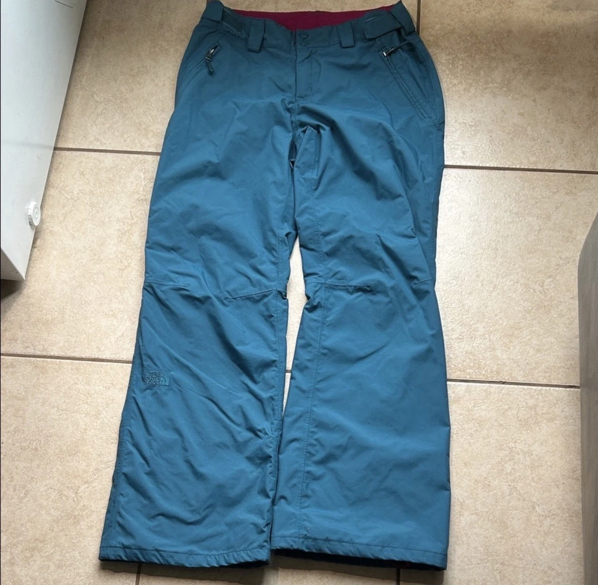 The North Face Teal Blue Women’s Snow Pants Size Medium has stains see pictures