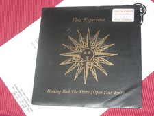 This Experience:  Holding back the years Promo + press release   7"  NM Unpla...