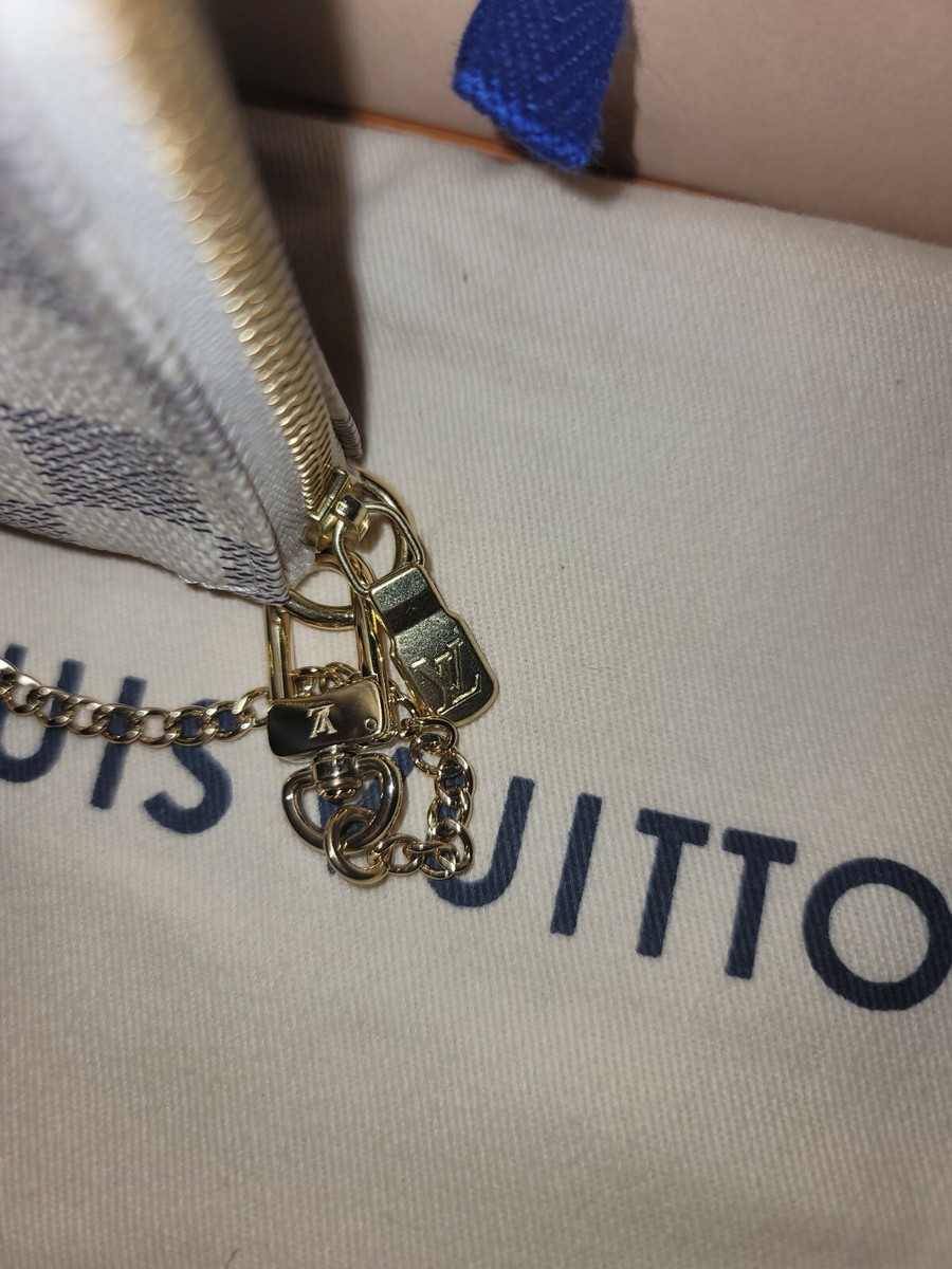 MINI POCHETTE LOUIS VUITTON HOLIDAYS LIMITED EDITION DAMIER