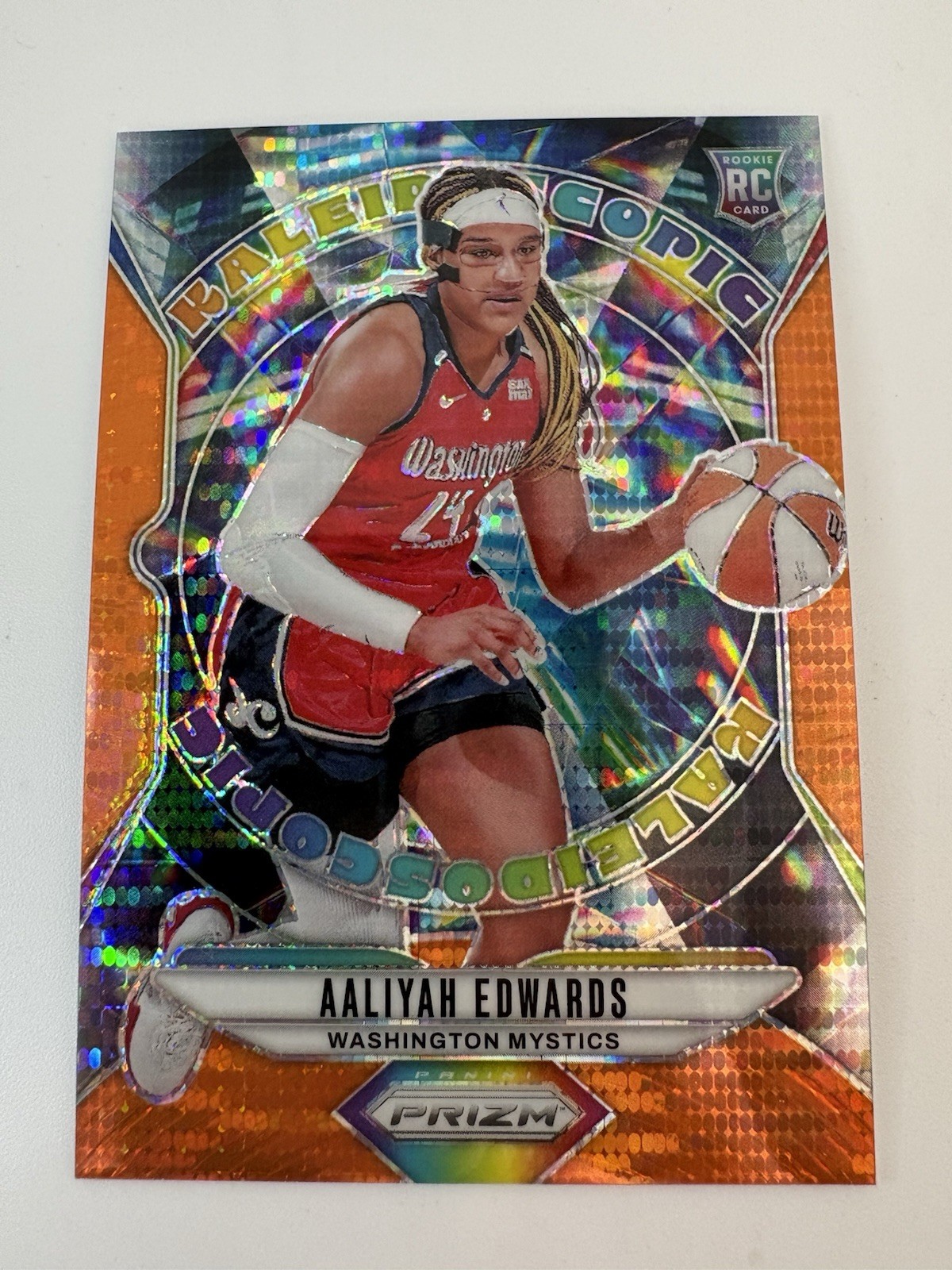 2024 Panini Prizm WNBA Aaliyah Edwards Kaleidoscopic Orange Pulsar 6 (/75)