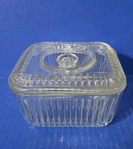 VIntage Anchor Hocking clear ribbed glass refrigerator dish with a lid.