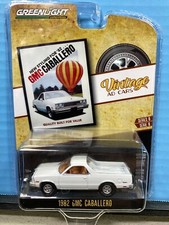 1/64 GREENLIGHT VINTAGE AD CARS 1982 GMC CABALLERO P/U WHITE & SADDLE INTERIOR