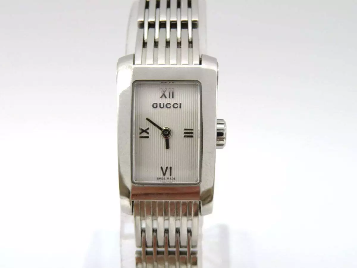 Rare montre femme Gucci ton argent   060624