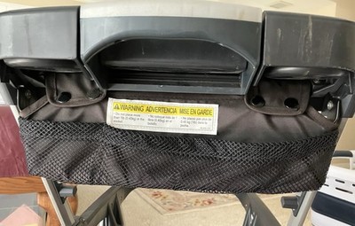 Rear parent pouch holder for Chicco KeyFit Caddy Baby Stroller. 