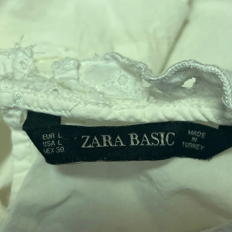 Blusa Top Zara Básica Blanca Bordada Ojales Volantes Manga 3/4 Peplum Talla L Foto 3 de 4