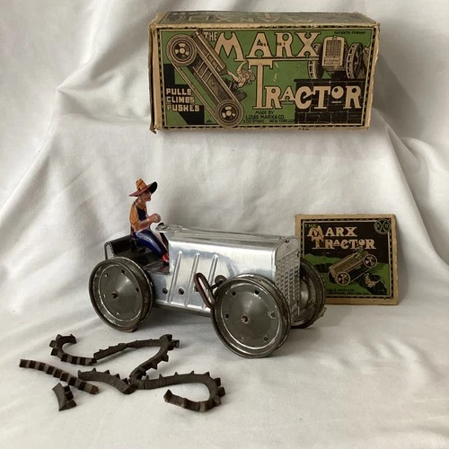 Marx Rare vintage marx tin toy wind up Climbing tractor