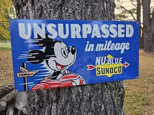 VINTAGE SUNOCO NU BLUE UNSURPASSED IN MILEAGE  PORCELAIN SIGN 12"x24"
