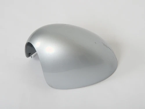 Genuine Mini Exterior mirror. Forward facing colored plastic housing