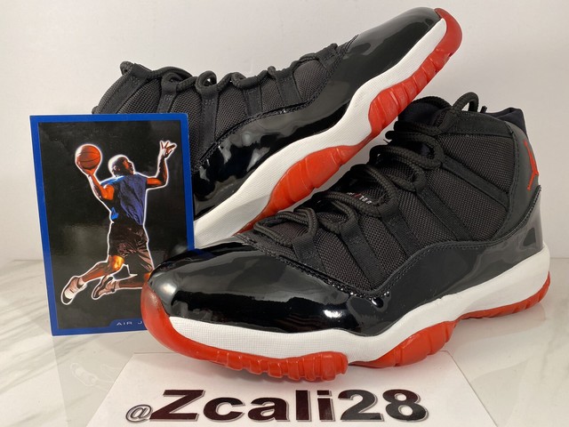 jordan 11 orange and black