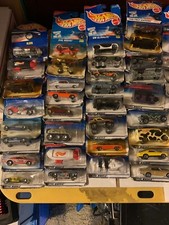 LOT OF 54 HOT WHEELS FROM 1998 AND AFTER BOXES IN ROUGH SHAPE