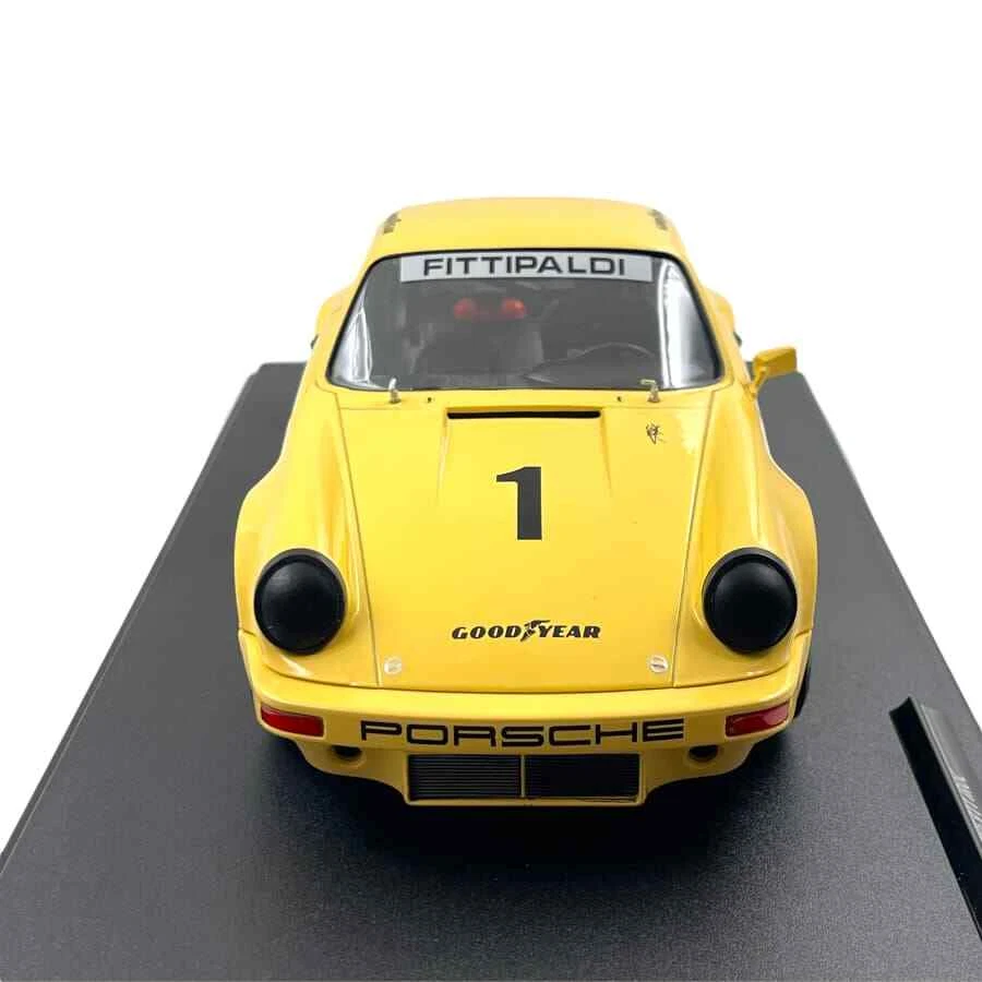 Modellino Auto Solido 1/18 Porsche 911 Iroc E. Fittipaldi #1 Yellow 1974 - Immagine 2 di 4