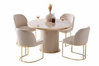 Elegantes Esszimmer-Set Mit Rundem Tisch Und Goldenen Akzenten