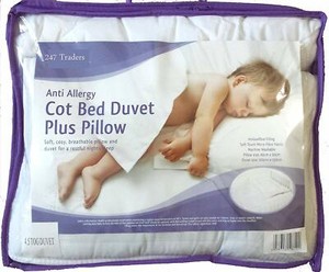 cot bed quilt and pillow