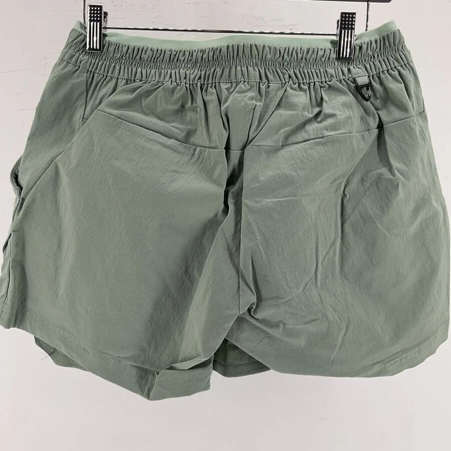 Nuovi con etichetta pantaloncini modulari da donna Salomon verde iceberg medio $90