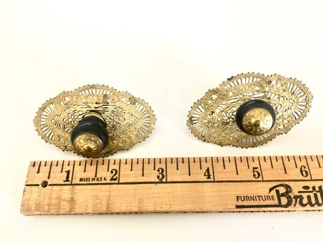 2 Antique brass and ebonized drawer pulls w/filigree back plates