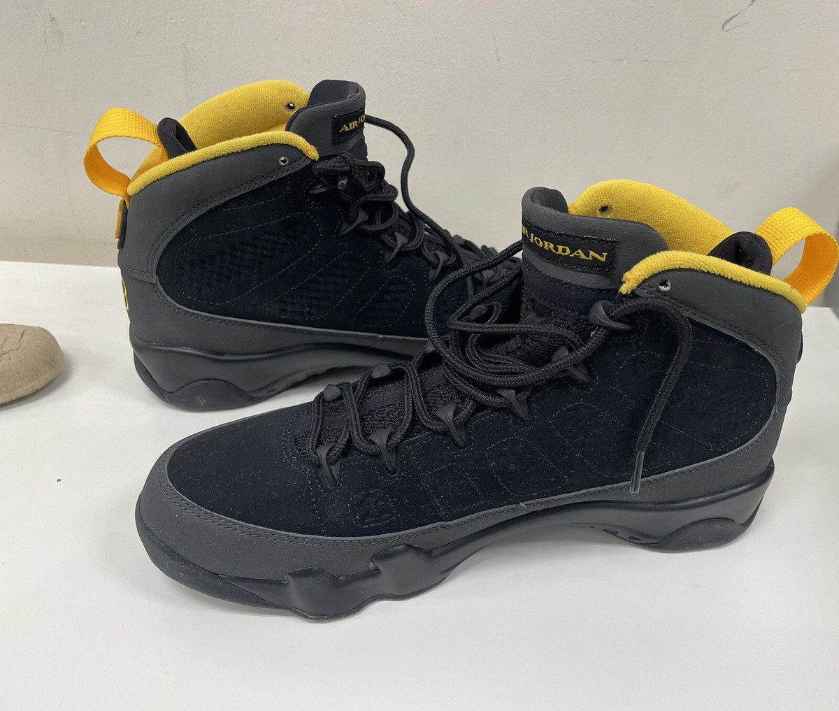 jordan retro 9 black university gold charcoal