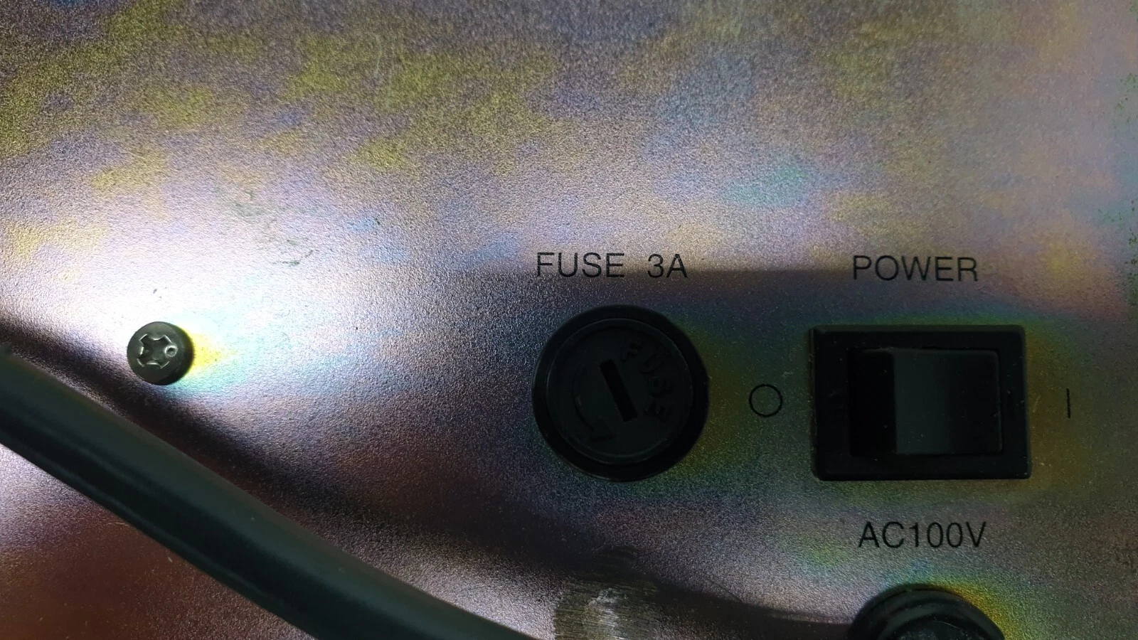 Close-up of the AC100V power switch and 3 A fuse holder on the TE6036A7
