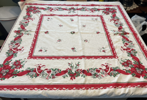 VINTAGE CHRISTMAS TABLECLOTH, 50" x 44" Santa, Red, Green, Faded Black