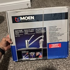 MOEN single handle kitchen faucet chrome with side spray in deck plate 87430