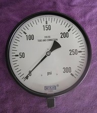 This is a WIKA stainless steel industrial pressure gauge. 300 psi