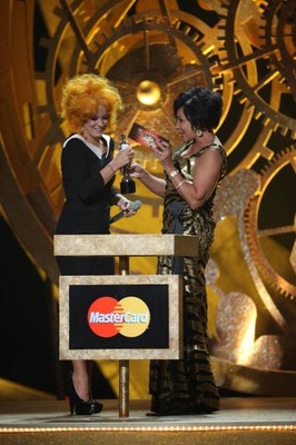Lily Allen accepts award from Shirley Bassey at the podium during - Old Photo 2