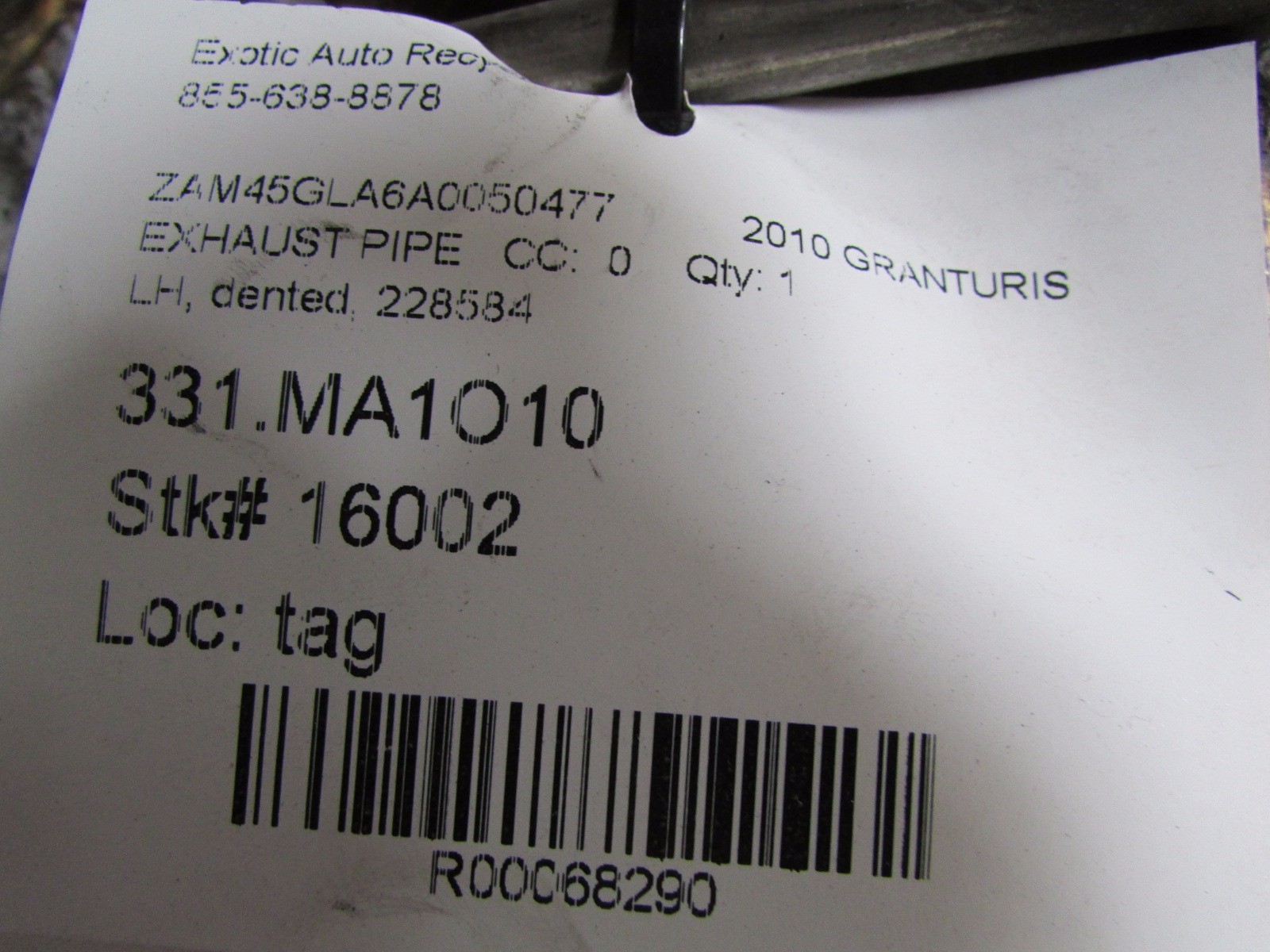 Maserati Granturismo, LH, Left Exhaust Pipe, Used, Dented, P/N 228584