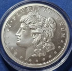 A 2 oz .999 Silver Morgan Style Proof Round Golden State Mint Capsule