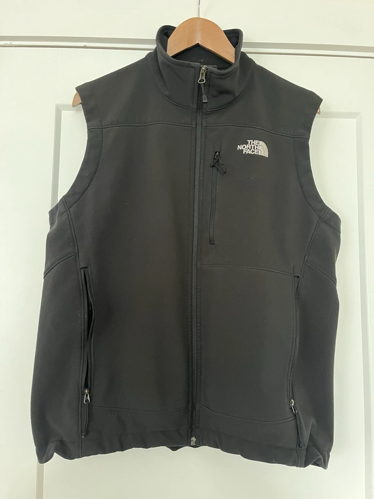The North Face Men's Black Full Zip Vest With Collar And Cinch Closure At Waist