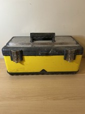 Yellow black portable toolbox stainless steel top surface secure metal latches.