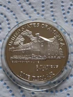 Photo of a 1990-P Eisenhower Commemorative Dollar from an eBay listing that sold on Jul 11, 2026