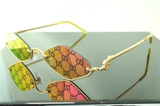 Gucci GG1604S 004 Gold with Pink Mirror Logo Lens Geometric Unisex Sunglasses