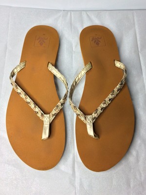 gold sparkly flip flops
