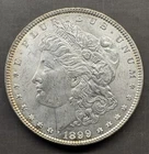 1899 - Morgan Silver Dollar - 90% Silver - HIGH GRADE