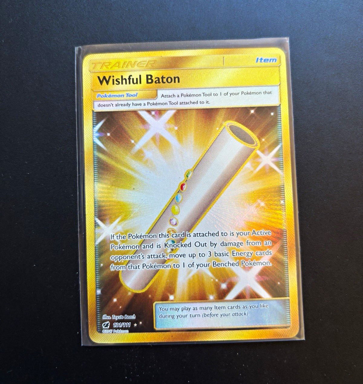 Wishful Baton 121/111 SM Crimson Invasion Secret Rare Holo EN